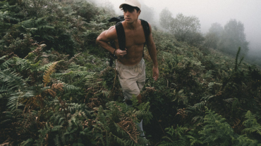 Topless hiking man