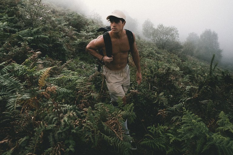 Topless hiking man