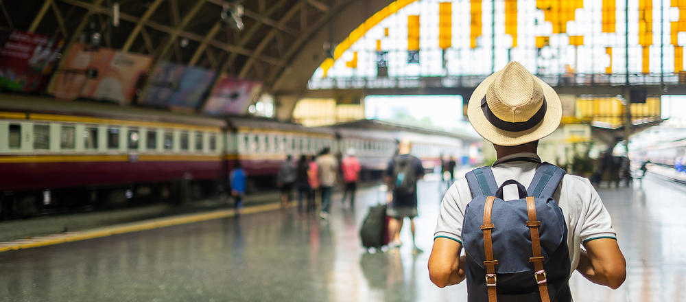 Traveler in train station