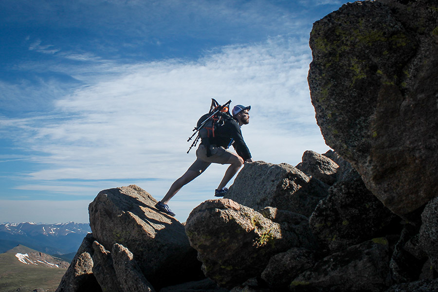 Hiker climbing a mountain