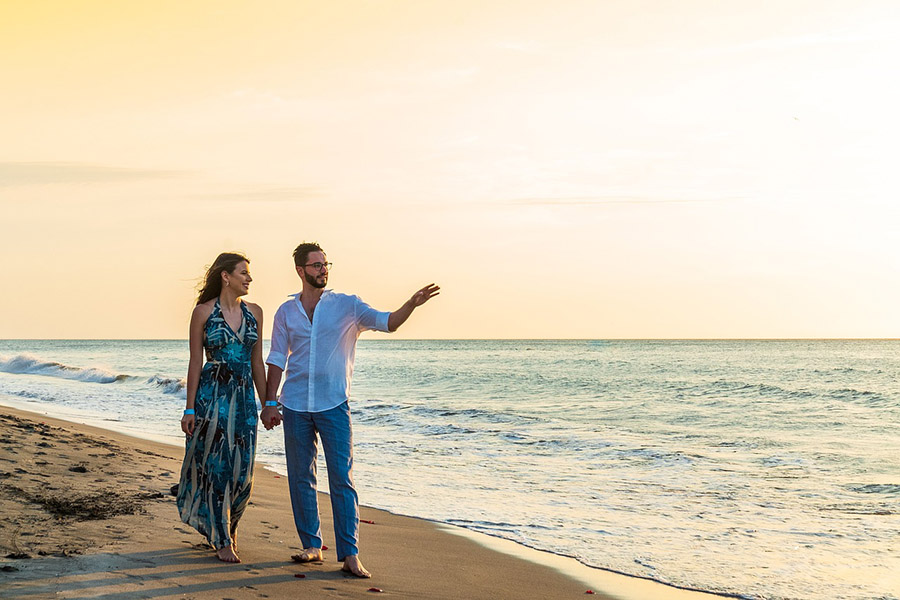 elegant couple on the beach