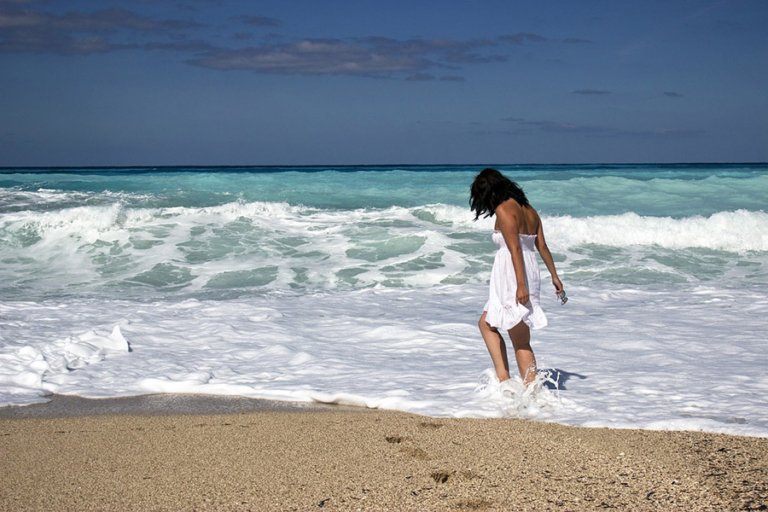 Wearing a dress at the beach