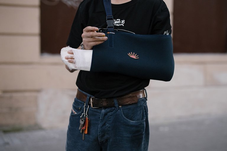 Person with injured arm