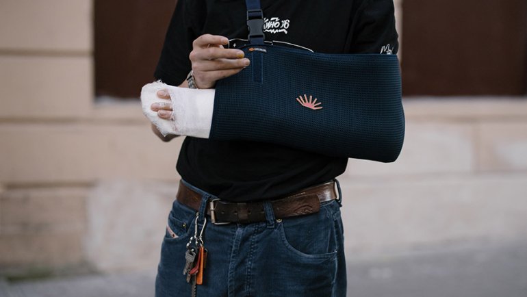 Person with injured arm