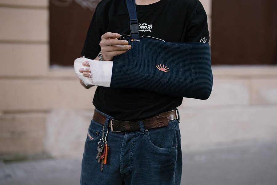 Person with injured arm