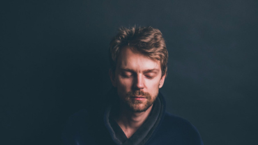 Man doing breathing exercises