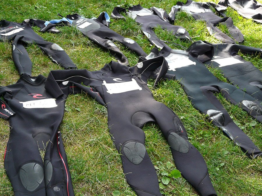 Wetsuits drying in the sun