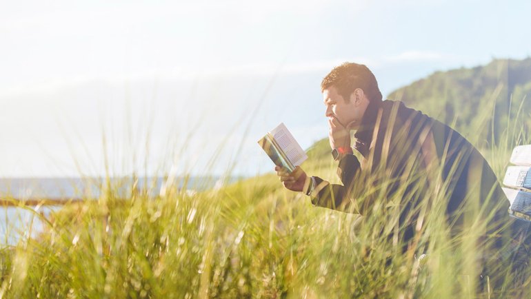 Student reading a book