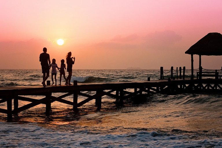 family on a pier