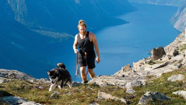 Man hiking with a dog
