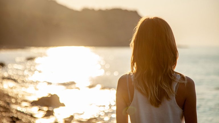 Tourist looking at the sea