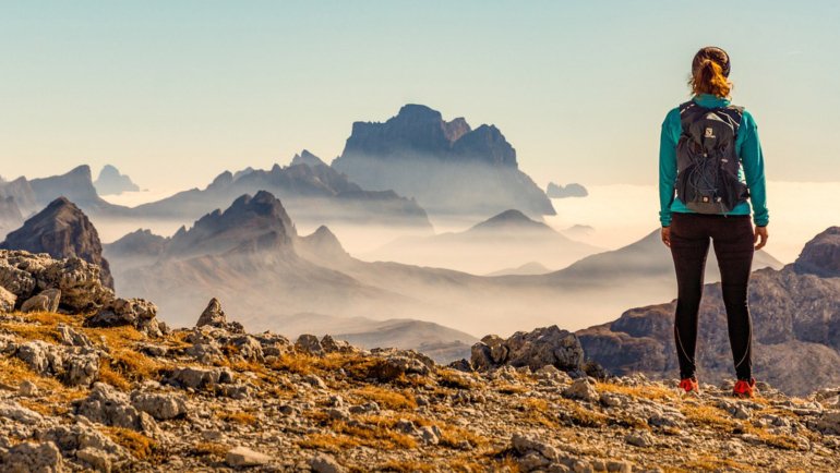 Woman in nature with a backpack