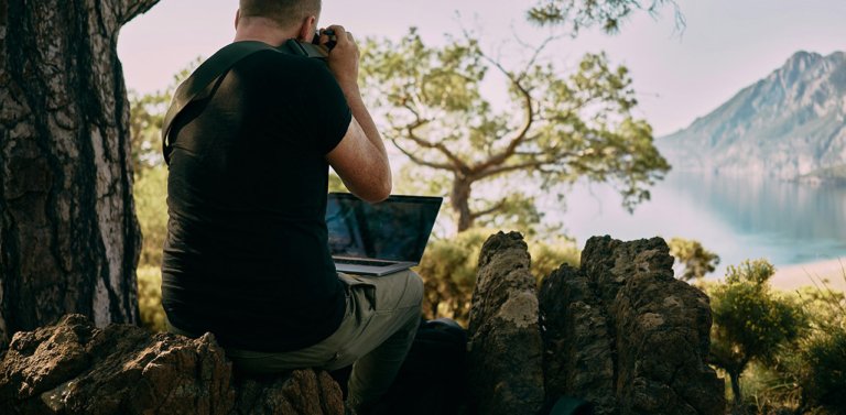 Man traveling with laptop