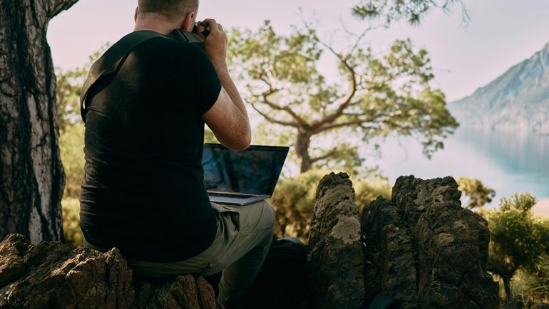Man traveling with laptop