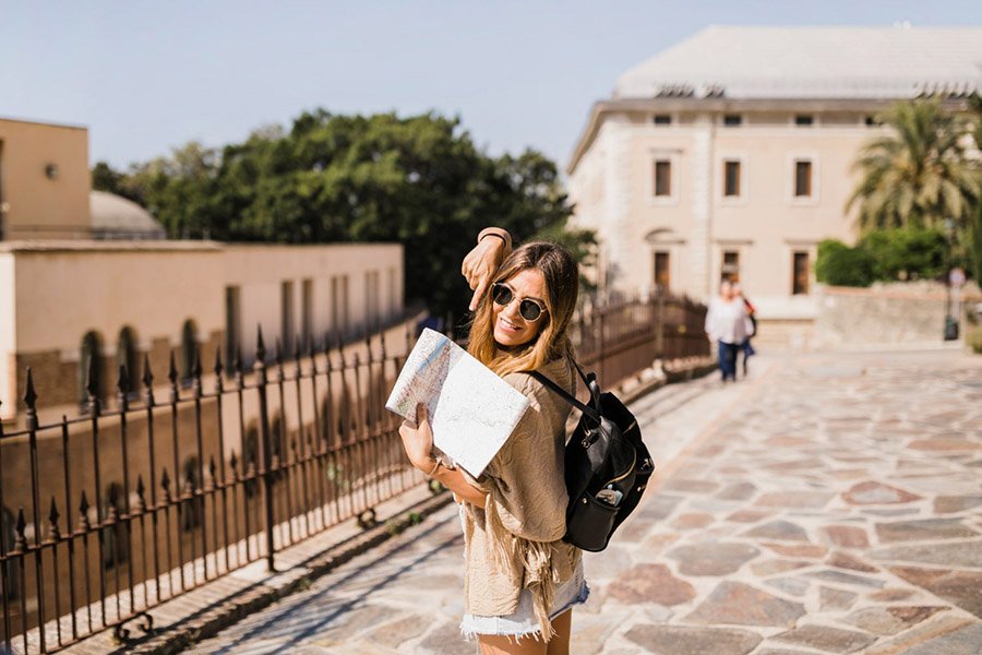 Tourist in Athens showing a map