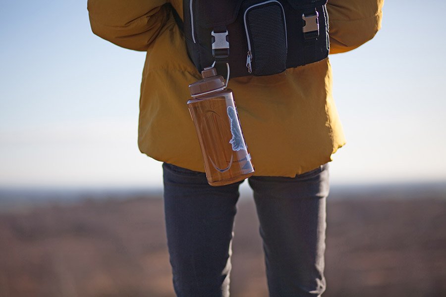 Traveler with a refillable bottle