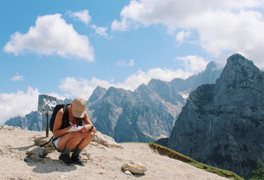 Student traveling and writing