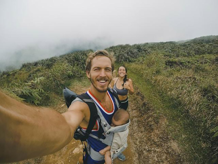 Parents hiking with baby