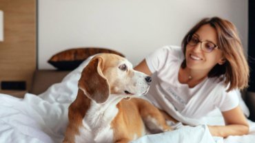 Woman and dog in hotel
