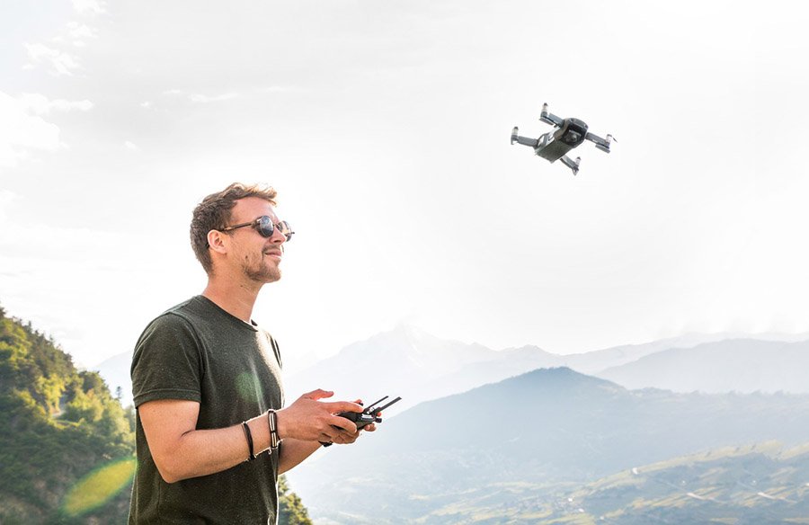 Man flying a drone