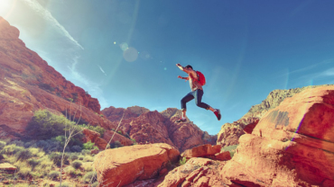 Man jumping in the mountains