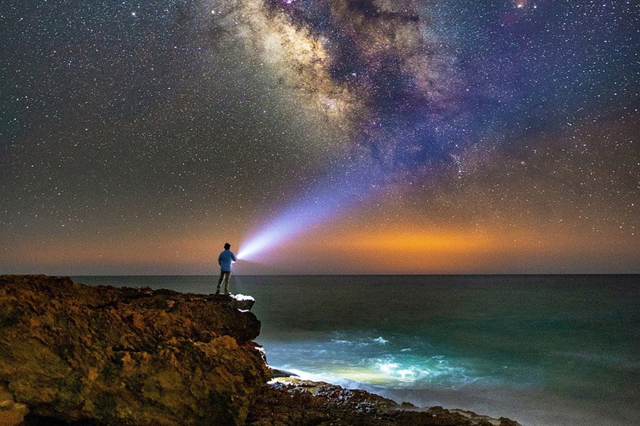 Man with a torch light