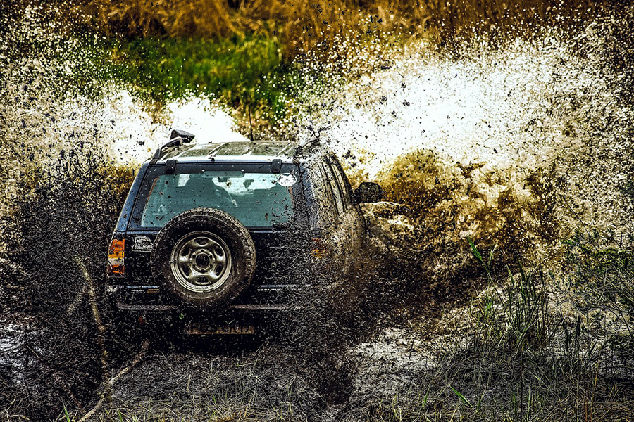 Car offroad in the mud