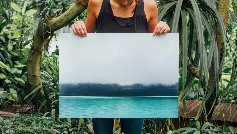 Person holding a canvas print