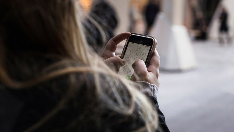 Person using her phone