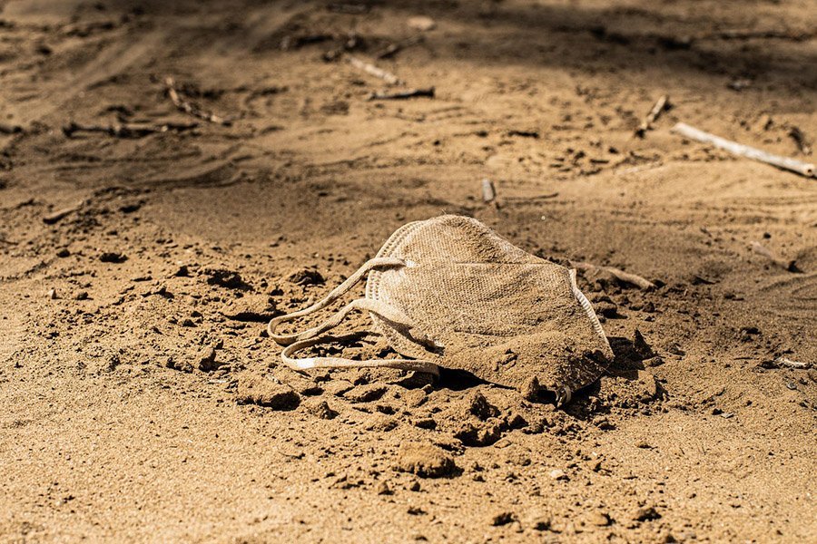 Abandoned face mask in nature